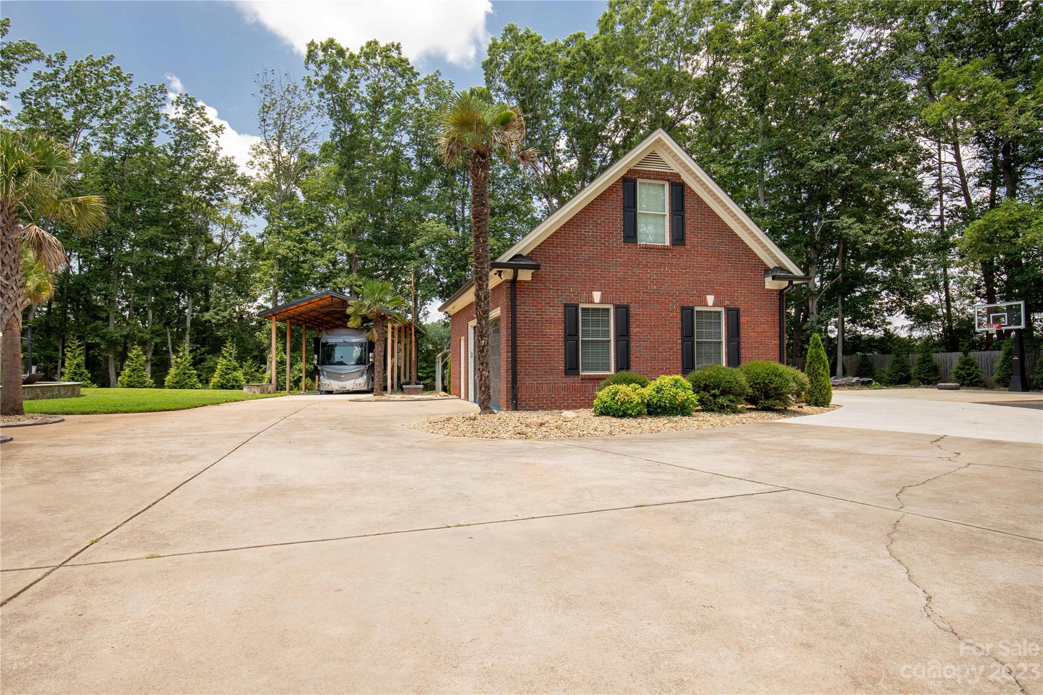 100 Generals Way Clover, SC 29710 - Photo 7 of 48 a front view of a house with a yard and trees