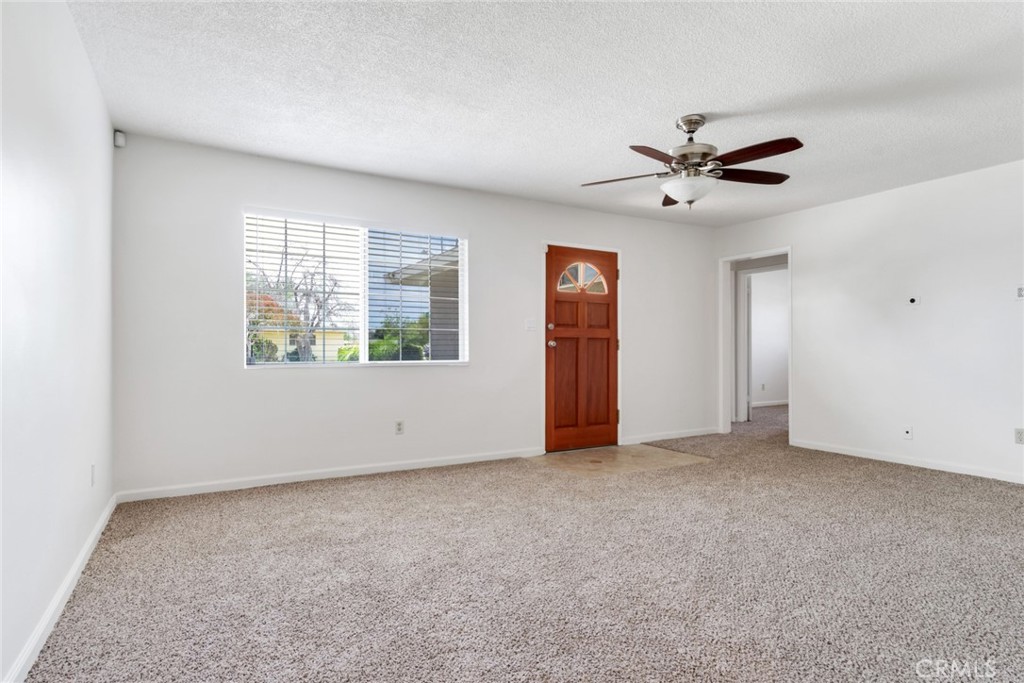 8955 Holly Lane Riverside, CA 92503 - Photo 3 of 32 a view of an empty room with a window