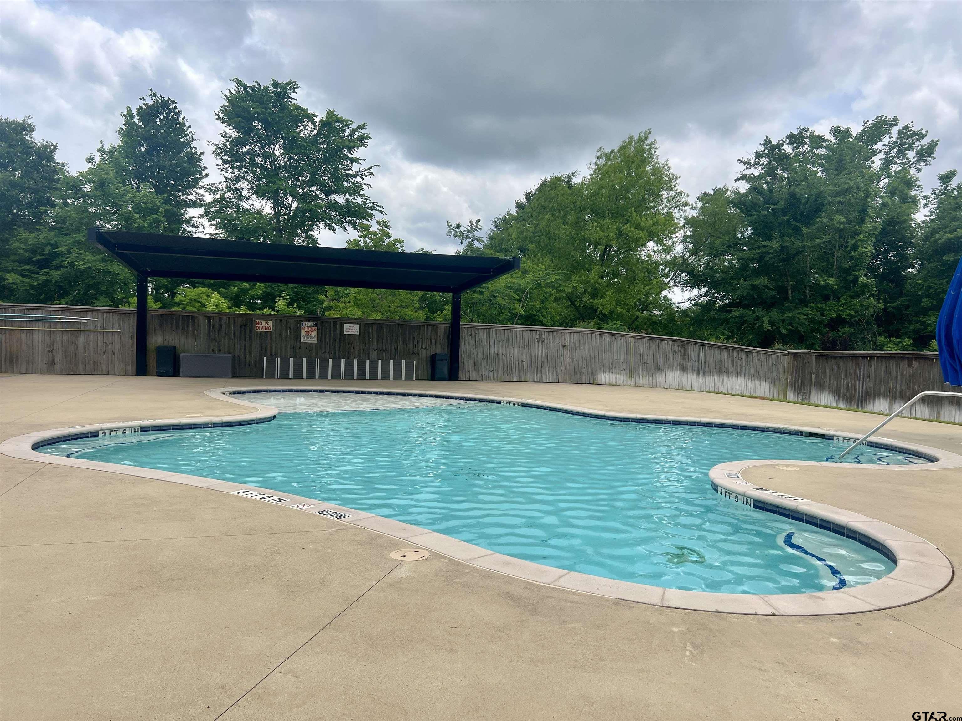 7315 Rolling Acres Place Tyler, TX 75707 - Photo 37 of 37 a view of outdoor space yard and swimming pool