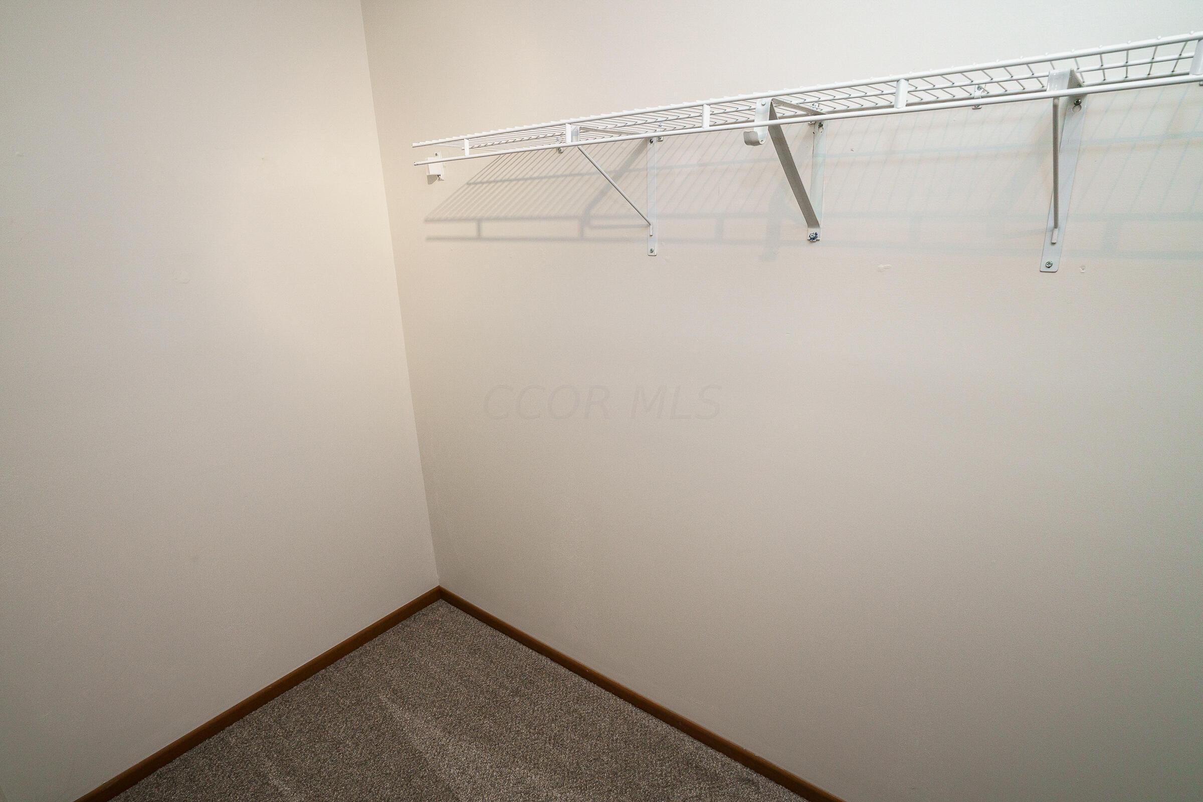 2135 Tonda Lane Grove City, OH 43123 - Photo 20 of 37 Primary bedroom features vaulted ceiling, freshly painted interior and 2 large closets