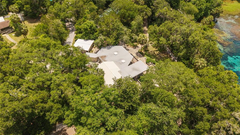 19639 Southwest 77th Loop Dunnellon, FL 34432 - Photo 57 of 59 an aerial view of residential house with outdoor space and trees all around