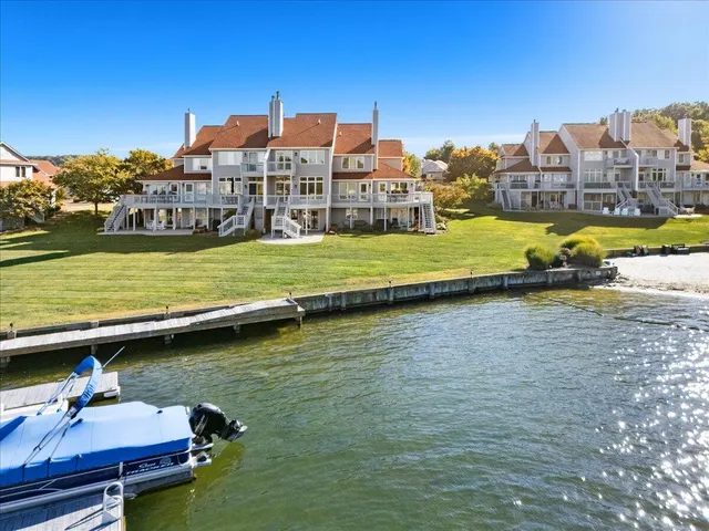 a view of a lake with a building in the background