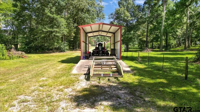 a view of a garden with a small yard