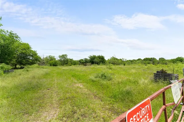 a view of lake with green space