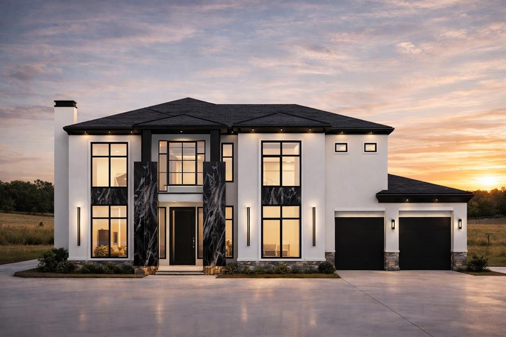 a front view of a house with a garage