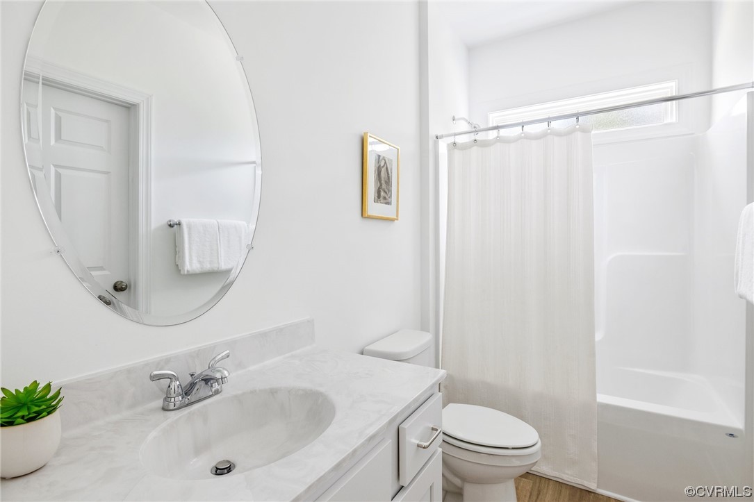 8357 Capernwray Drive Chesterfield, VA 23838 - Photo 19 of 50 a bathroom with a sink toilet and shower