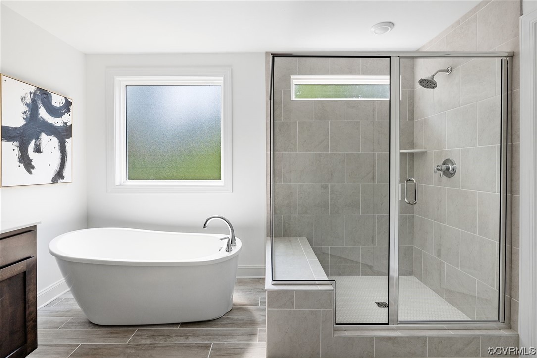 8357 Capernwray Drive Chesterfield, VA 23838 - Photo 34 of 50 a bathroom with a bathtub and shower