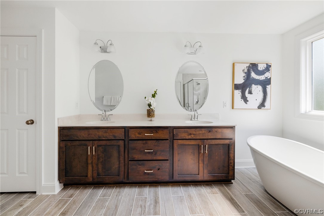 8357 Capernwray Drive Chesterfield, VA 23838 - Photo 35 of 50 a living room with a mirror and a table