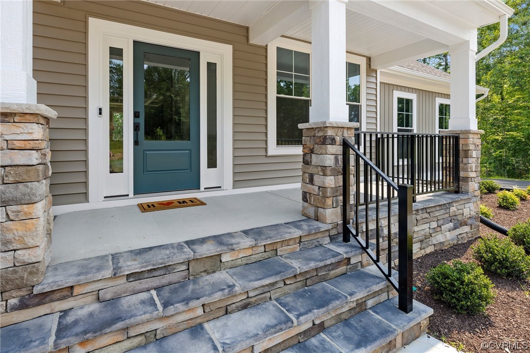 8357 Capernwray Drive Chesterfield, VA 23838 - Photo 48 of 50 a view of a small yard and a wooden deck