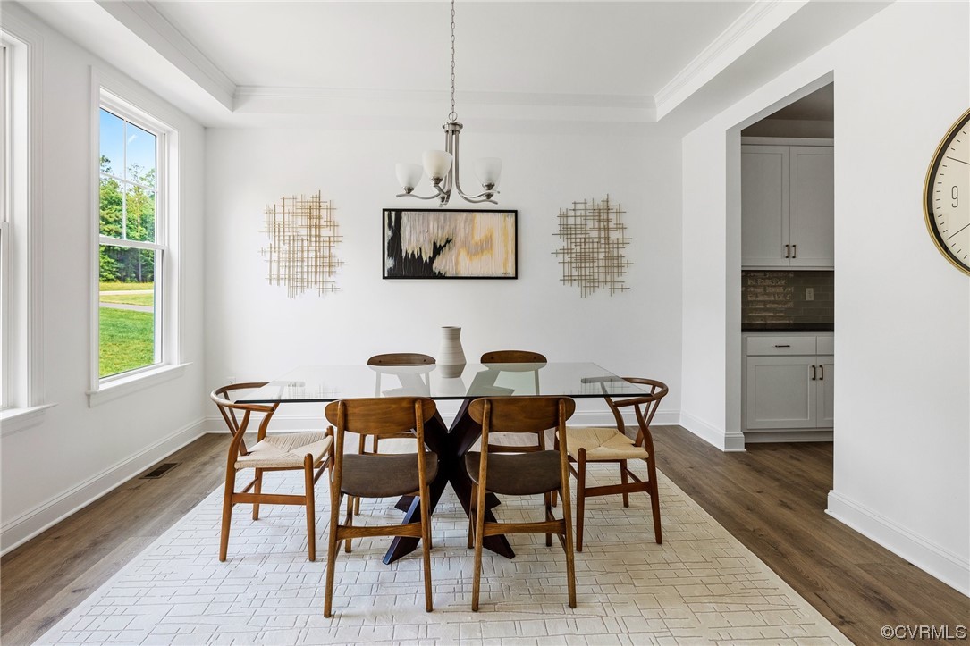 8357 Capernwray Drive Chesterfield, VA 23838 - Photo 6 of 50 a view of a dining room with furniture and window