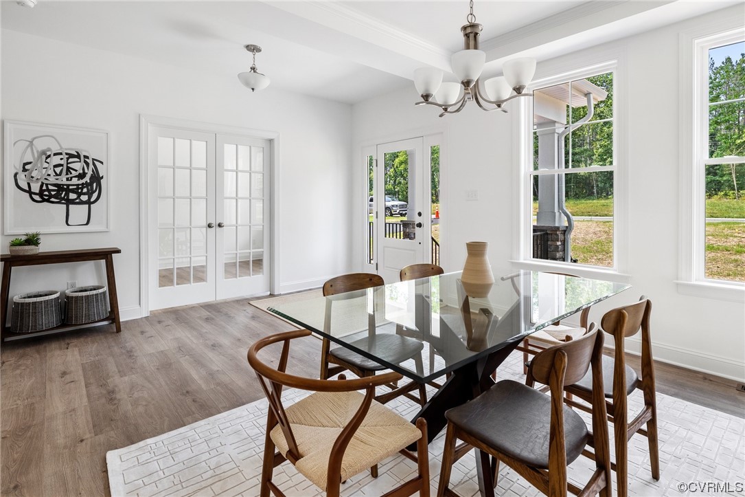 8357 Capernwray Drive Chesterfield, VA 23838 - Photo 8 of 50 a view of a dining room with furniture window and wooden floor