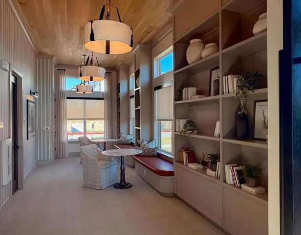 a room with lots of clutter and furniture