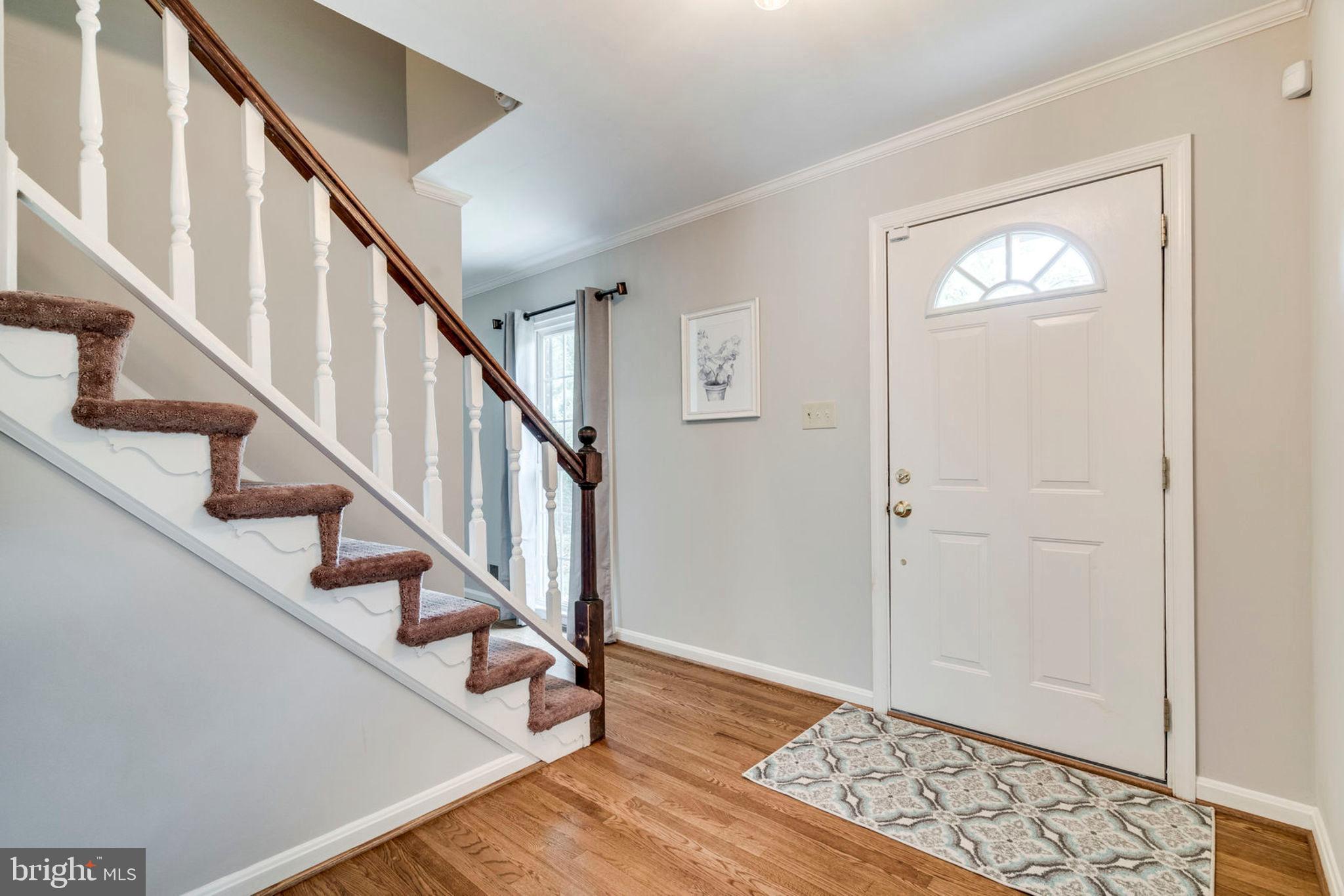 8817 Cuttermill Place Springfield, VA 22153 - Photo 5 of 37 Center Hall Stairs leads to bedroooms