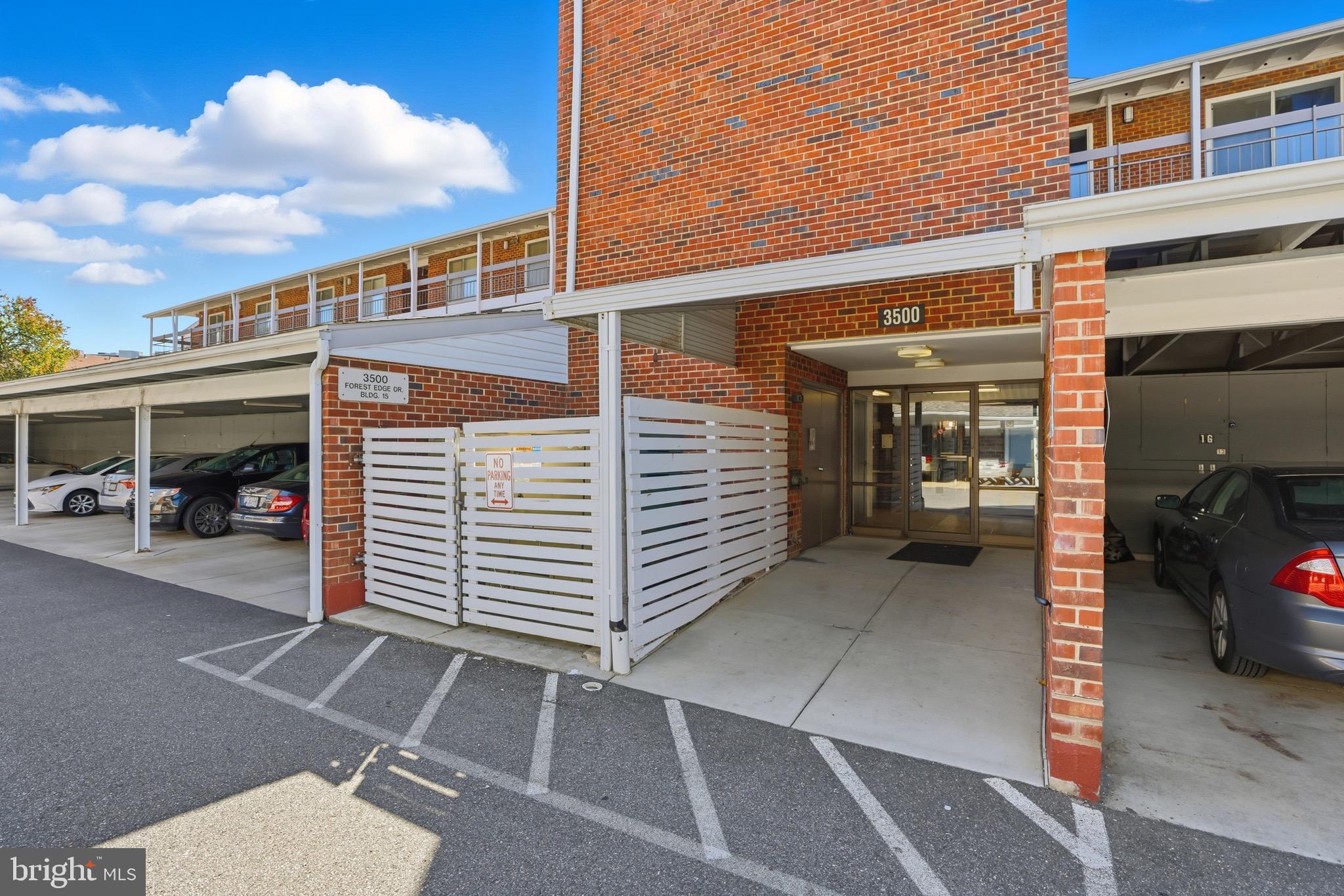 3500 Forest Edge Drive, Unit 152F Silver Spring, MD 20906 - Photo 1 of 31 a view of a parking area