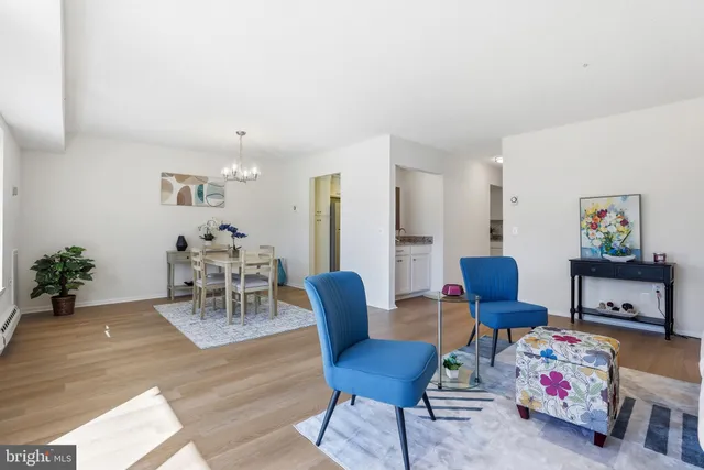 a view of balcony with wooden floor and fence