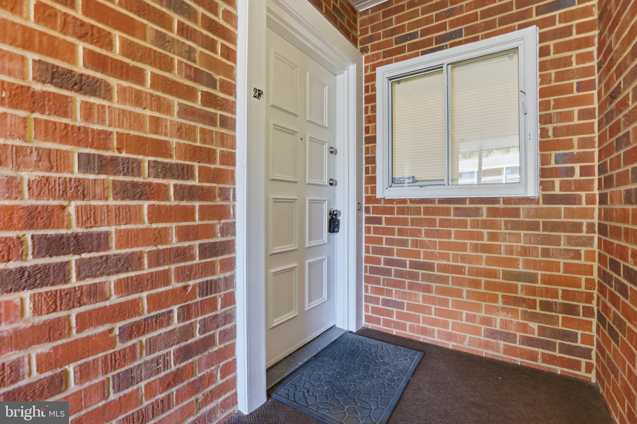 3500 Forest Edge Drive, Unit 152F Silver Spring, MD 20906 - Photo 4 of 31 a view of a brick wall