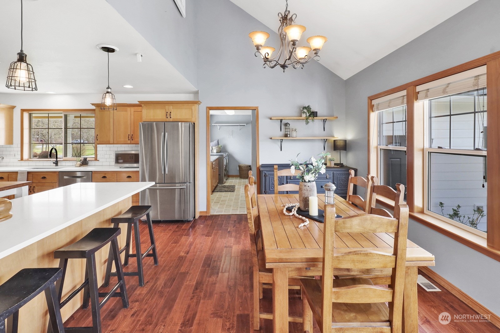 5747 Silverstar Road Bellingham, WA 98226 - Photo 9 of 40 a view of a dining room with furniture window and wooden floor
