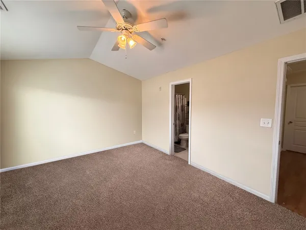 front view of a house with a small yard