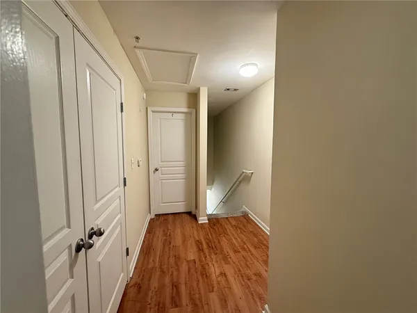 an aerial view of a swimming pool with outdoor seating