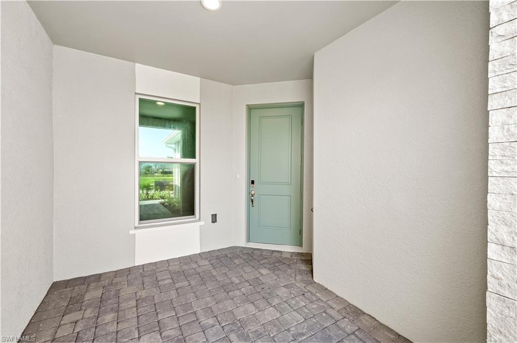 8897 Oceana Way Naples, FL 34114 - Photo 21 of 40 Front porch entry