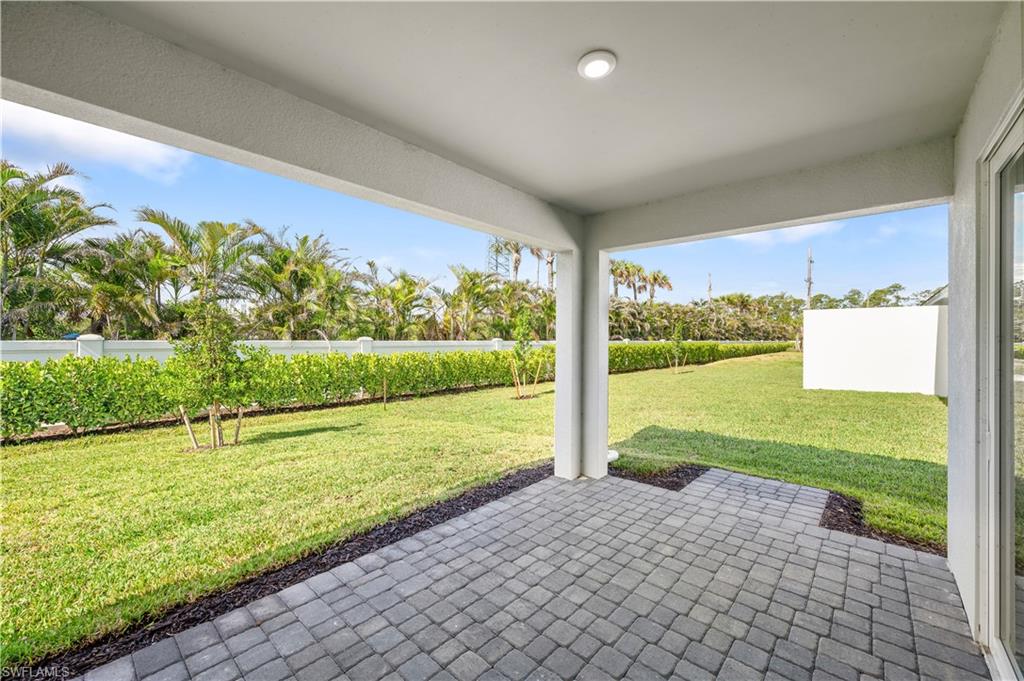 8897 Oceana Way Naples, FL 34114 - Photo 8 of 40 Southern exposed backyard covered lanai