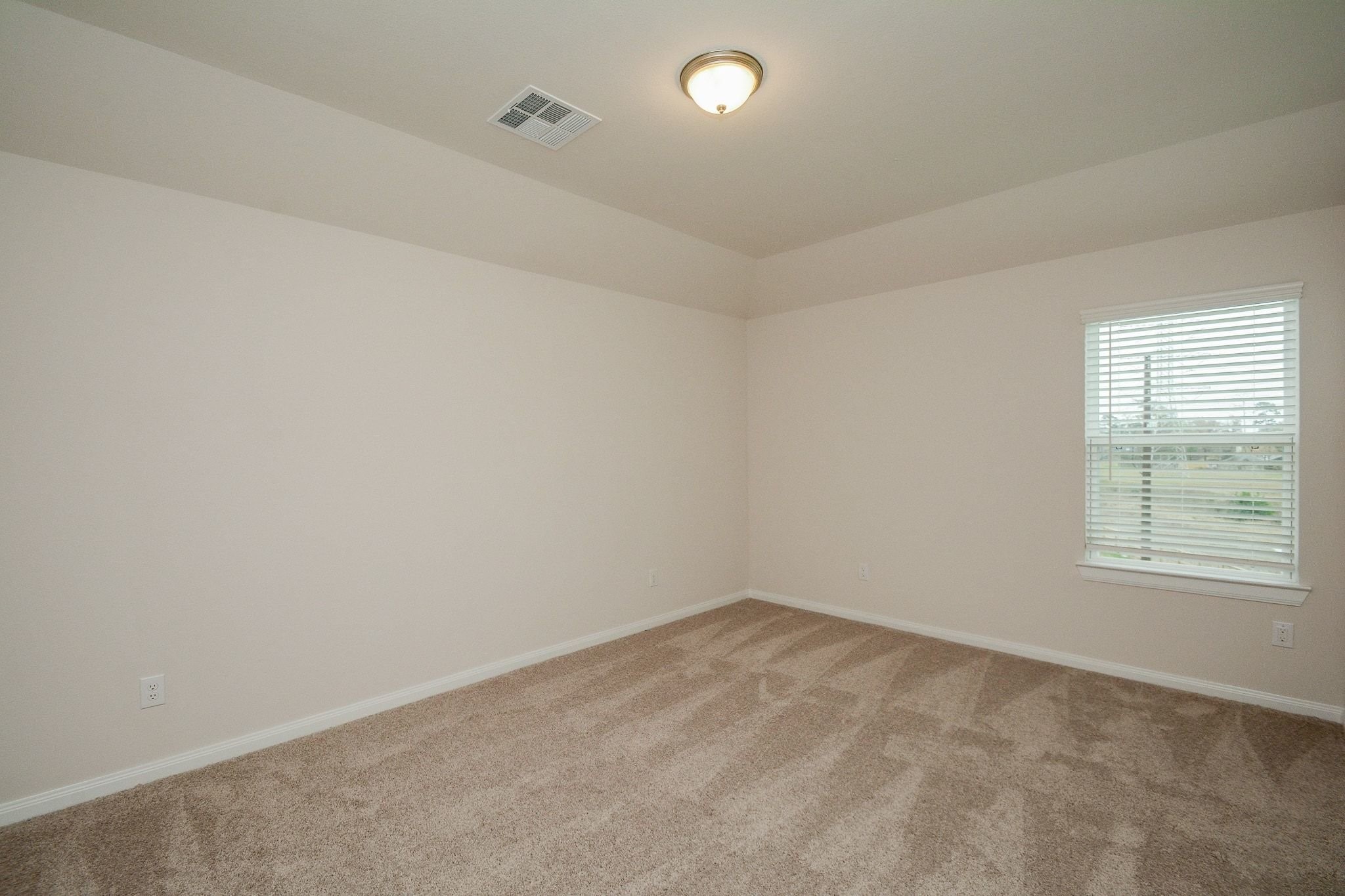 20629 Dynamic Court Humble, TX 77338 - Photo 17 of 36 an empty room with a window