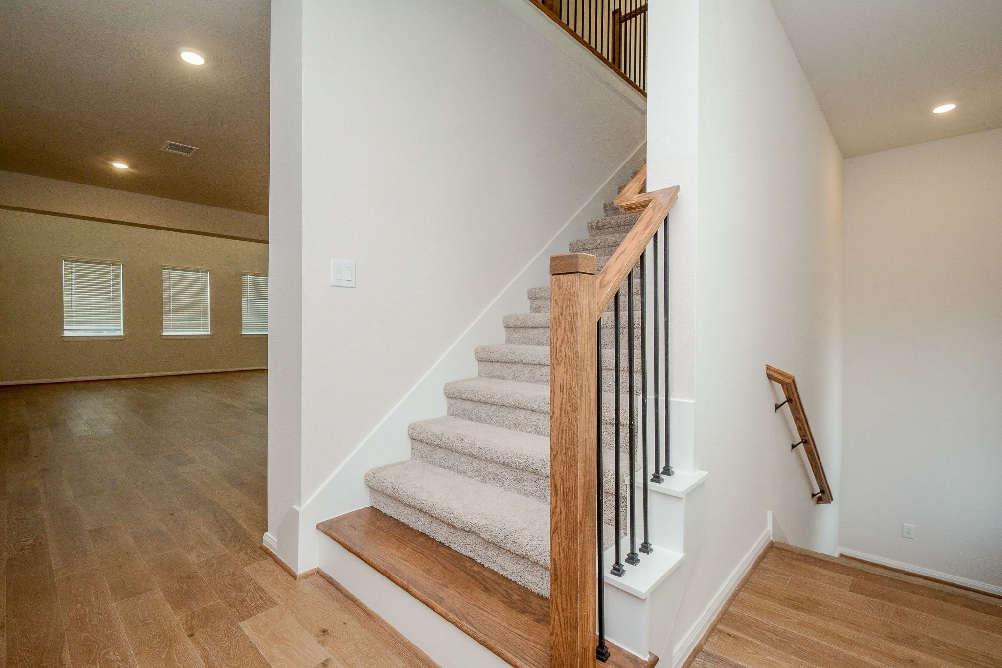 20629 Dynamic Court Humble, TX 77338 - Photo 2 of 36 a view of entryway and hall with wooden floor