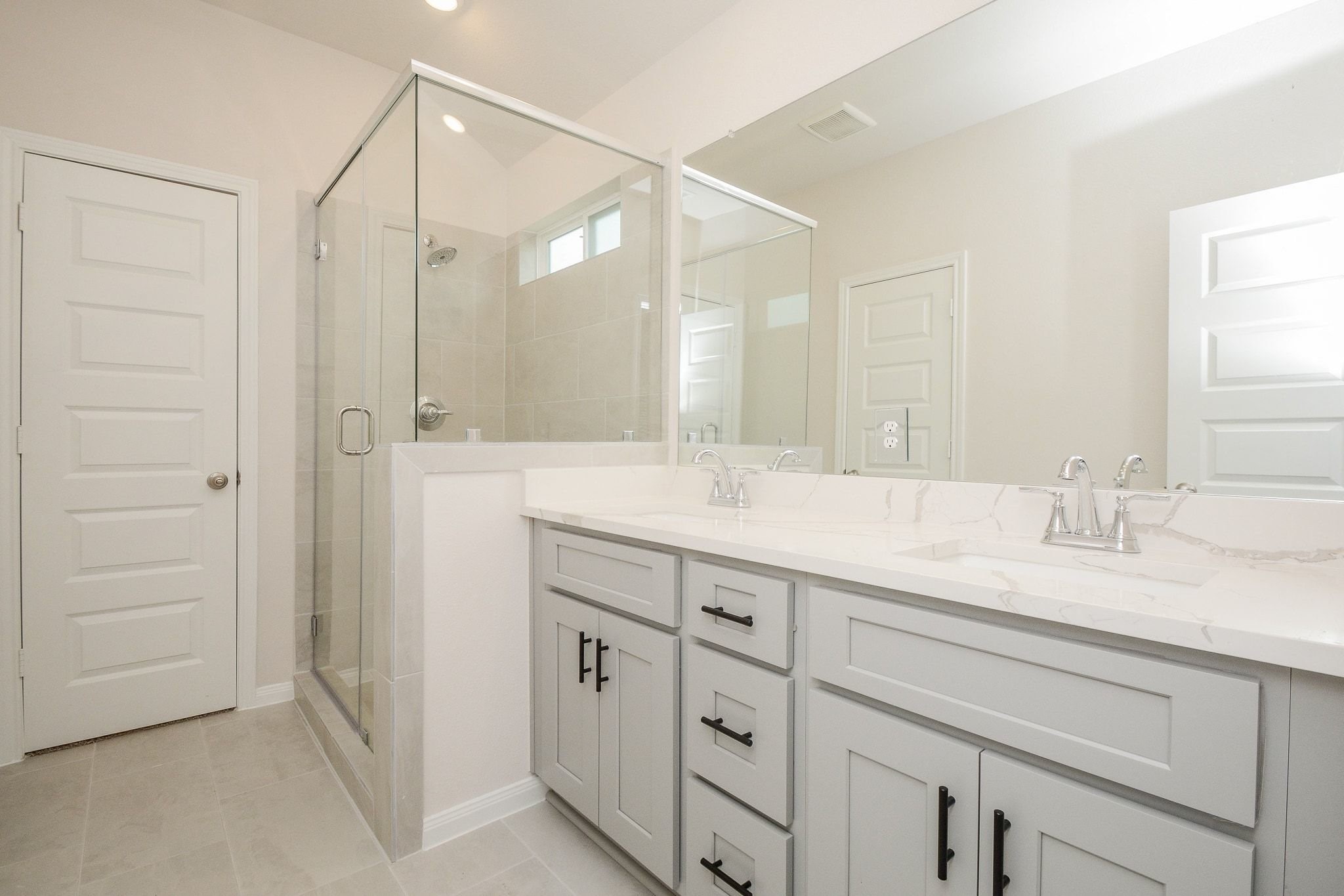 20629 Dynamic Court Humble, TX 77338 - Photo 29 of 36 a bathroom with a granite countertop sink mirror and double
