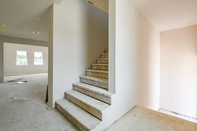 an entryway with a staircase