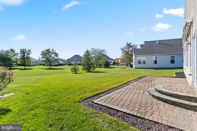 a view of a house with a big yard