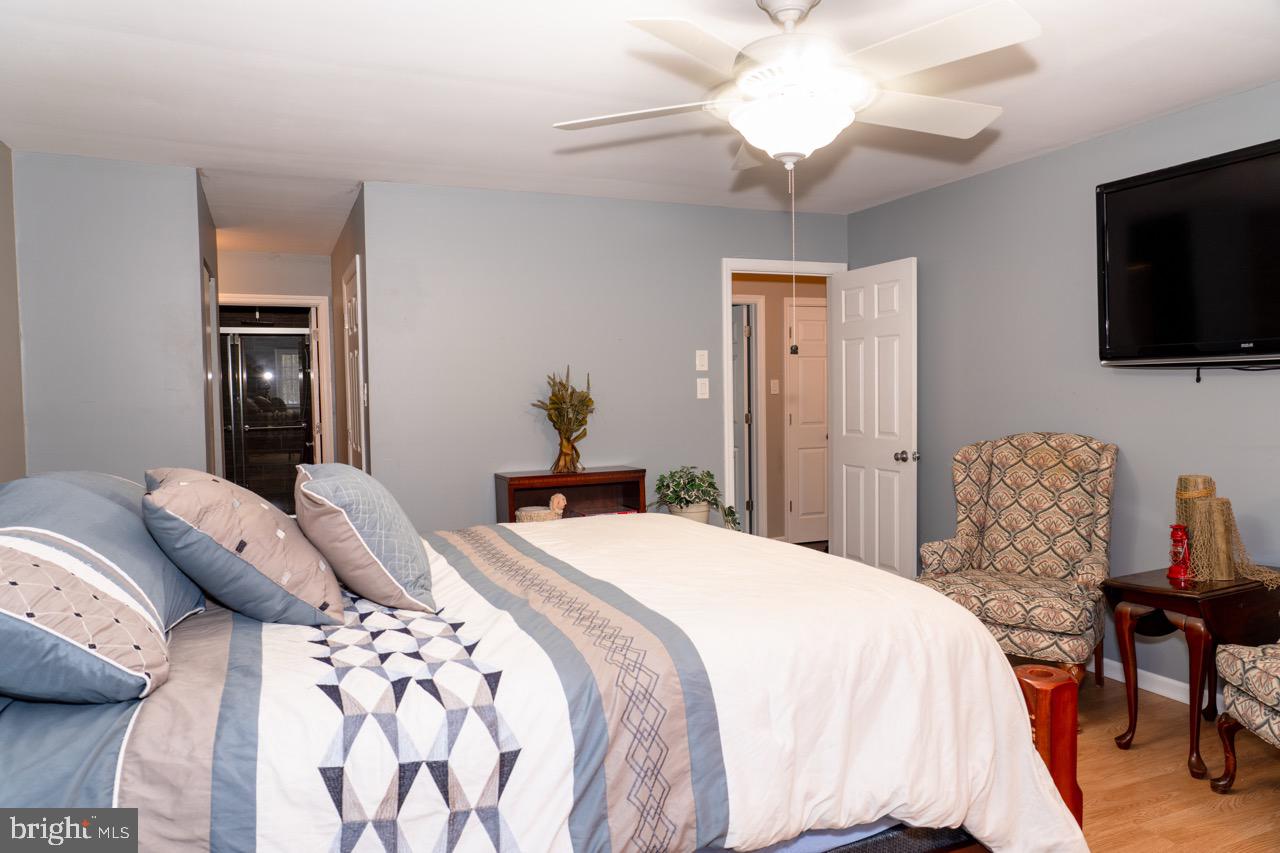 17 Red Oak Drive Tabernacle, NJ 08088 - Photo 24 of 45 a bedroom with a bed and a flat screen tv