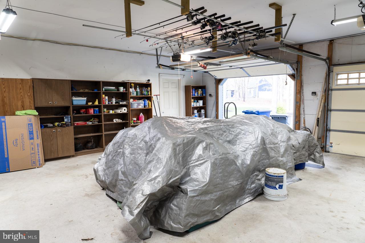 17 Red Oak Drive Tabernacle, NJ 08088 - Photo 28 of 45 a living room with lots of furniture and storage