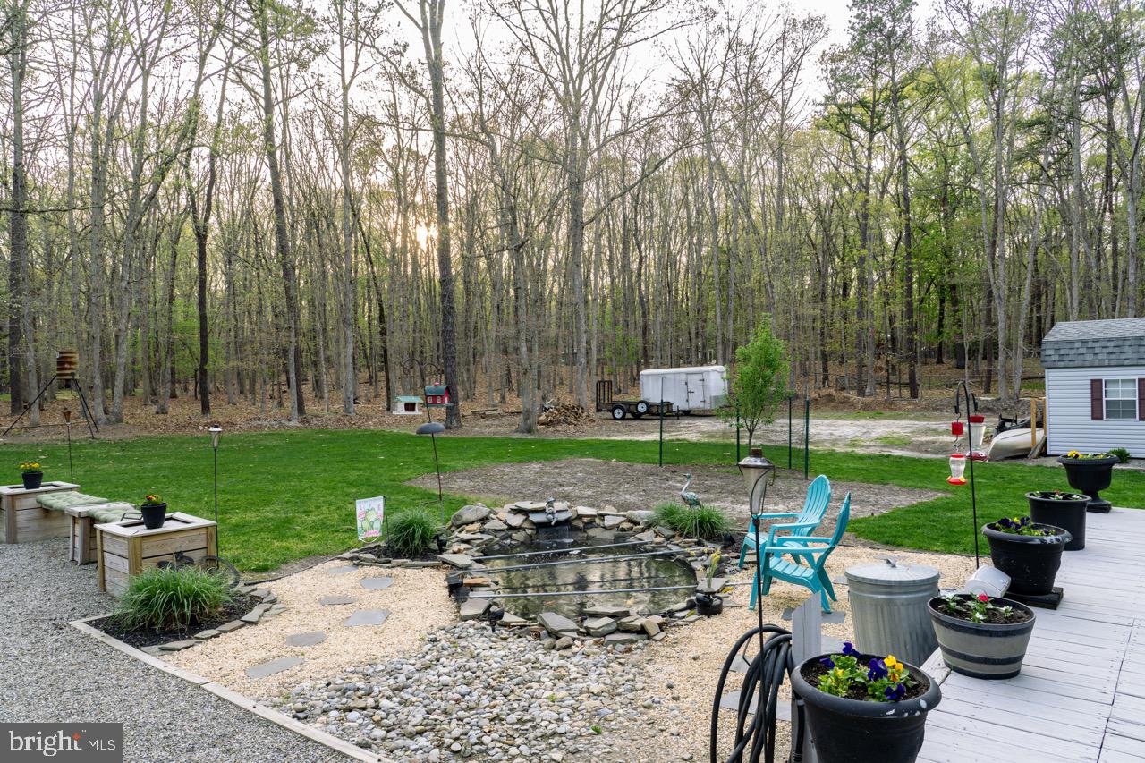 17 Red Oak Drive Tabernacle, NJ 08088 - Photo 37 of 45 a view of a garden with sitting area