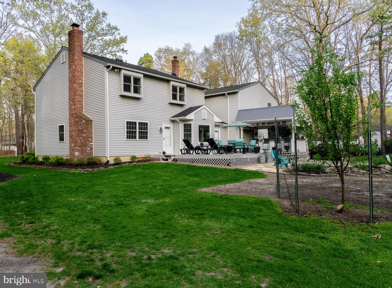 17 Red Oak Drive Tabernacle, NJ 08088 - Photo 43 of 45 a front view of a house with a yard and trees