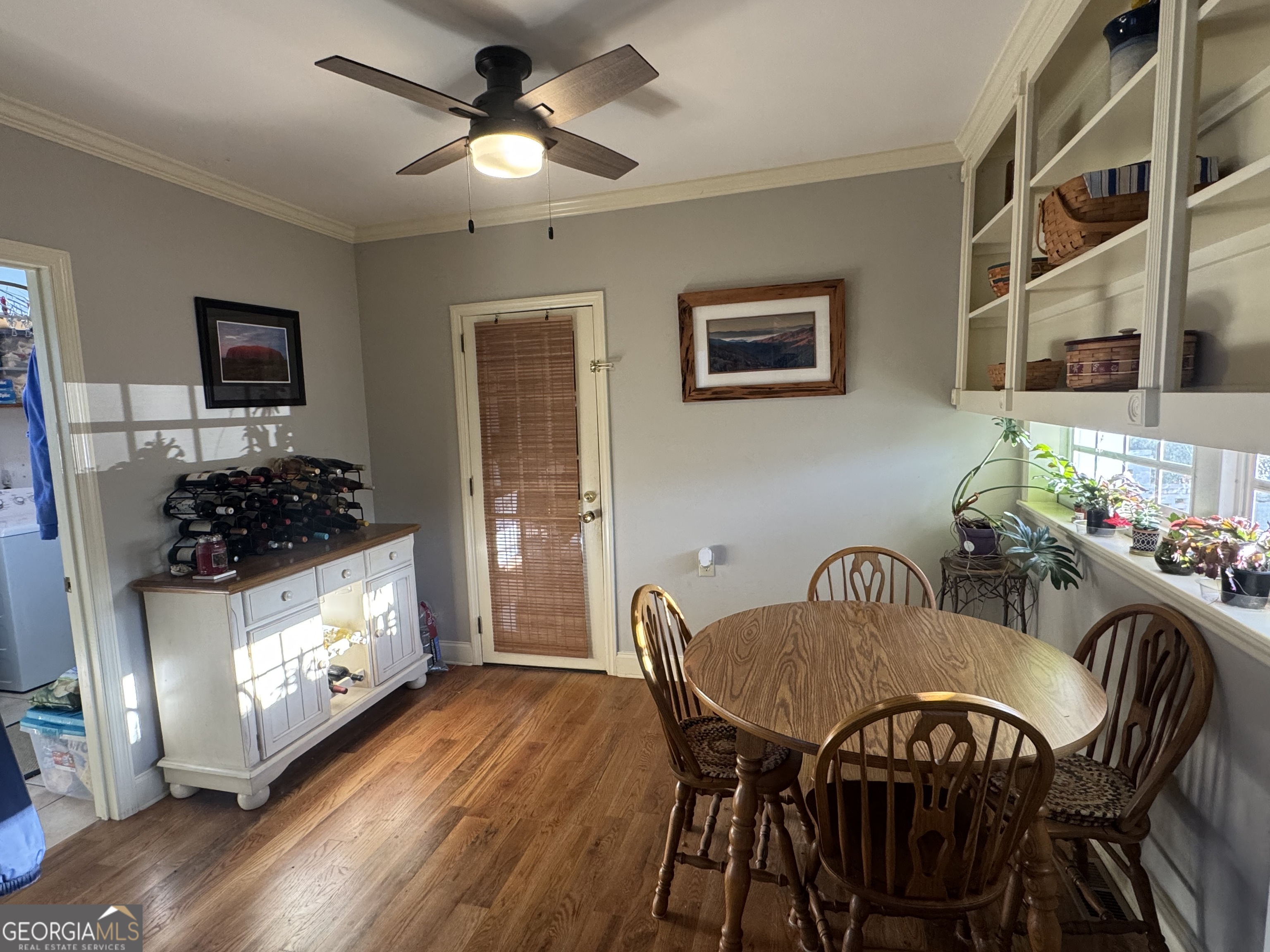 722 Maple Drive Griffin, GA 30224 - Photo 12 of 28 a view of a dining room with furniture and wooden floor