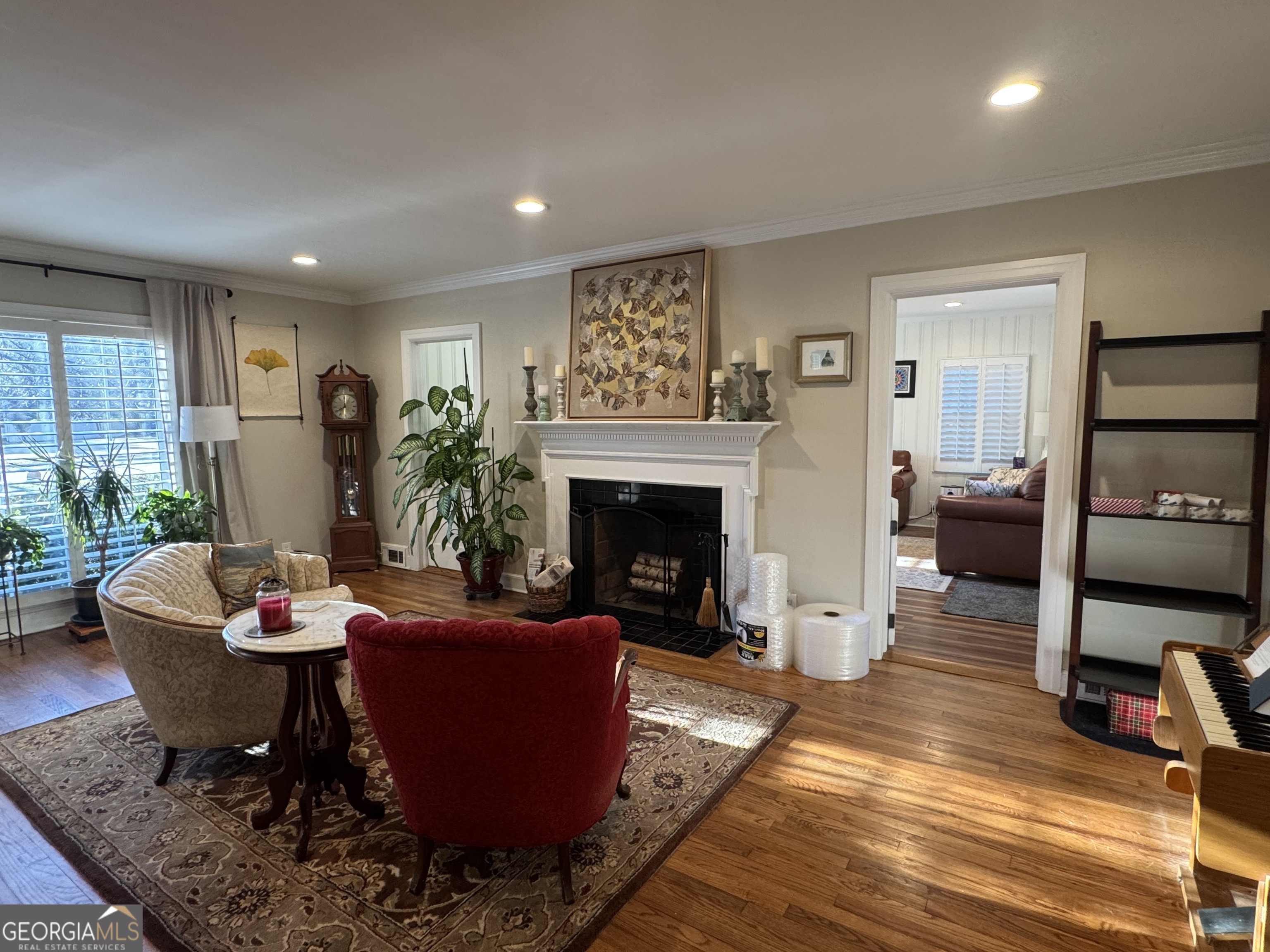 722 Maple Drive Griffin, GA 30224 - Photo 15 of 28 a living room with furniture and a fireplace