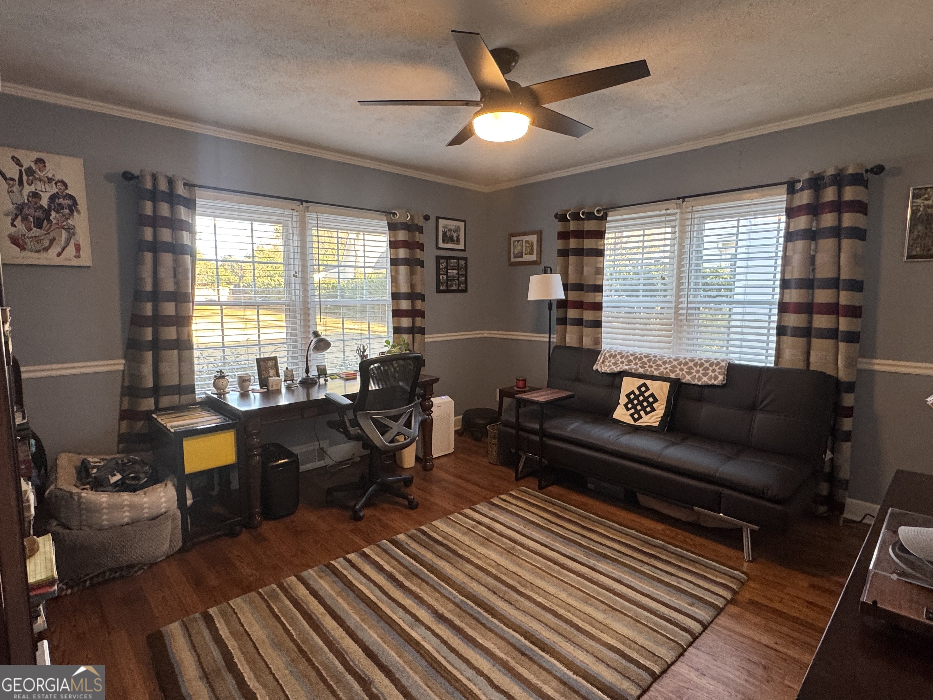 722 Maple Drive Griffin, GA 30224 - Photo 20 of 28 a living room with furniture and a window