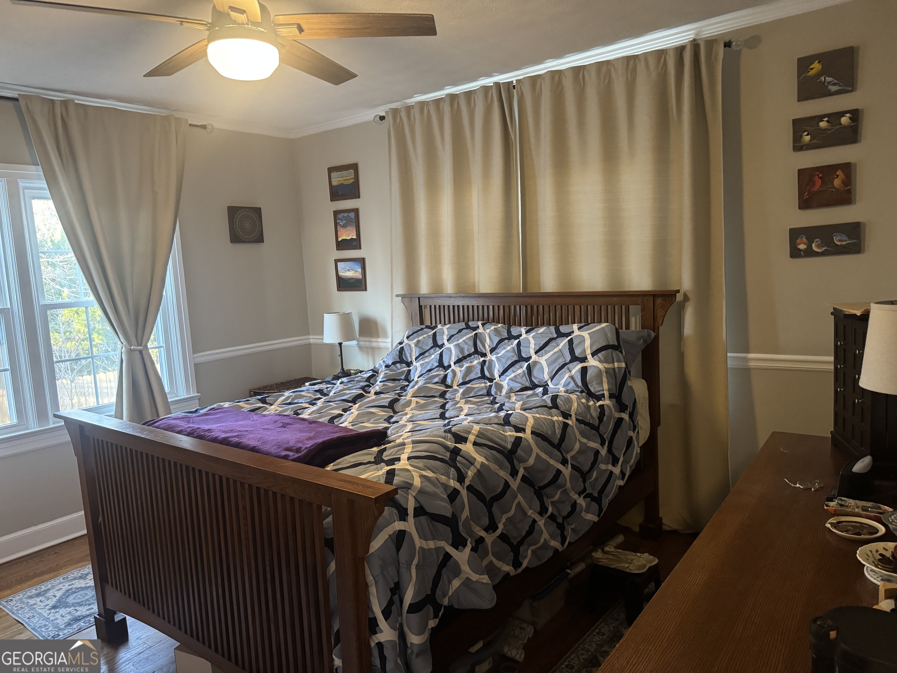 722 Maple Drive Griffin, GA 30224 - Photo 25 of 28 a bedroom with a bed and a window