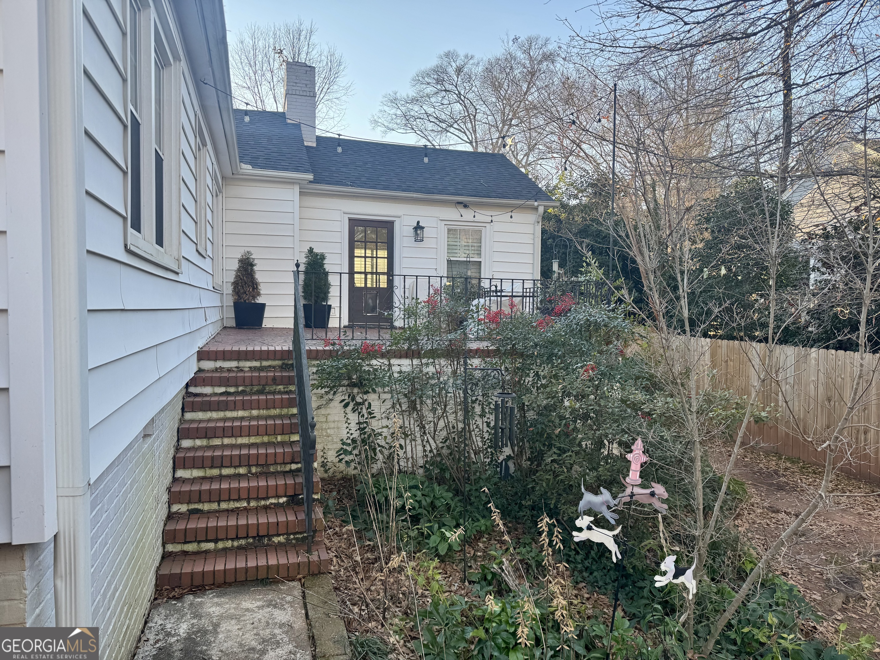 722 Maple Drive Griffin, GA 30224 - Photo 3 of 28 a view of a house with backyard and garden