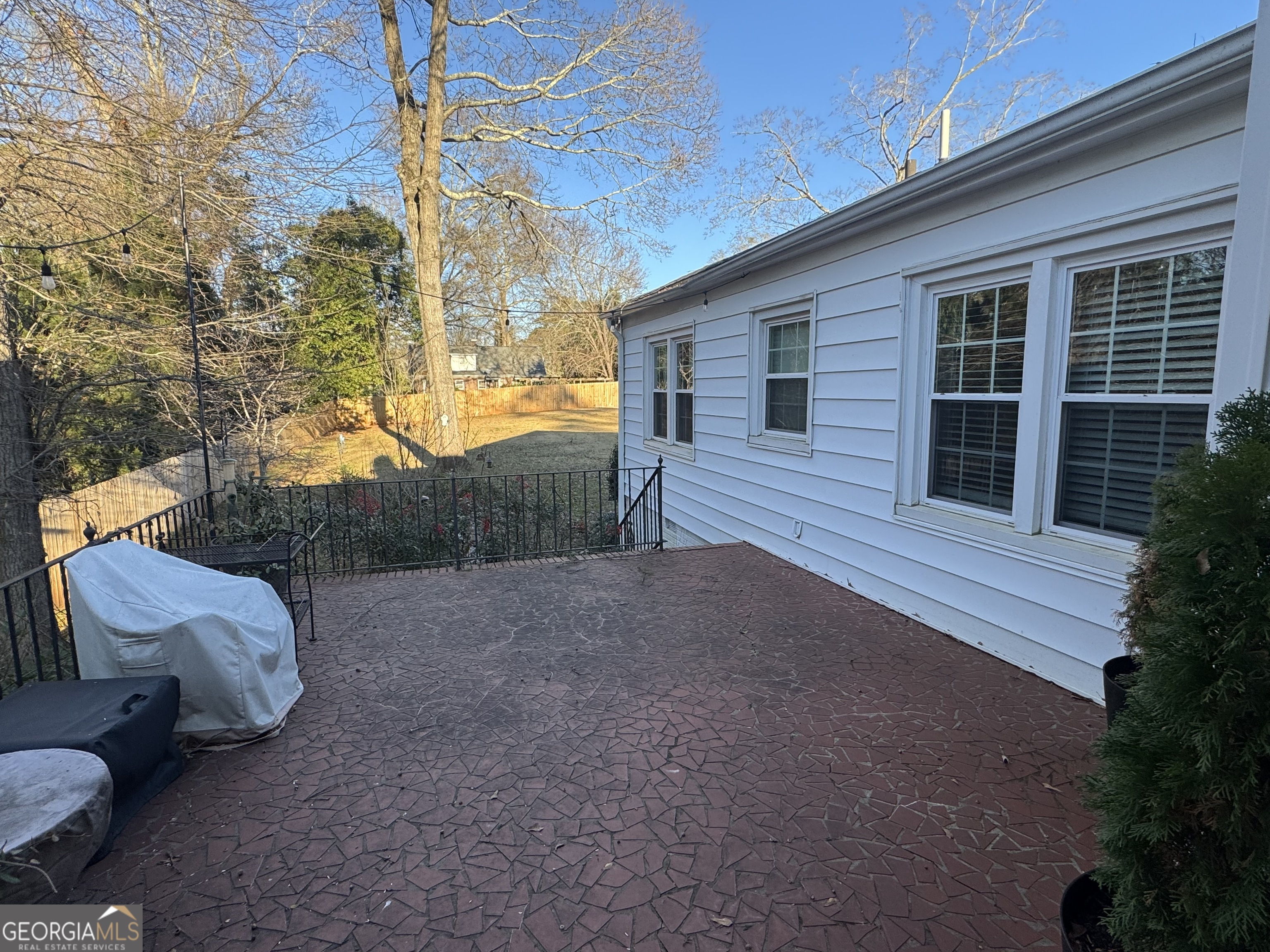 722 Maple Drive Griffin, GA 30224 - Photo 4 of 28 a view of a two chairs in the back yard