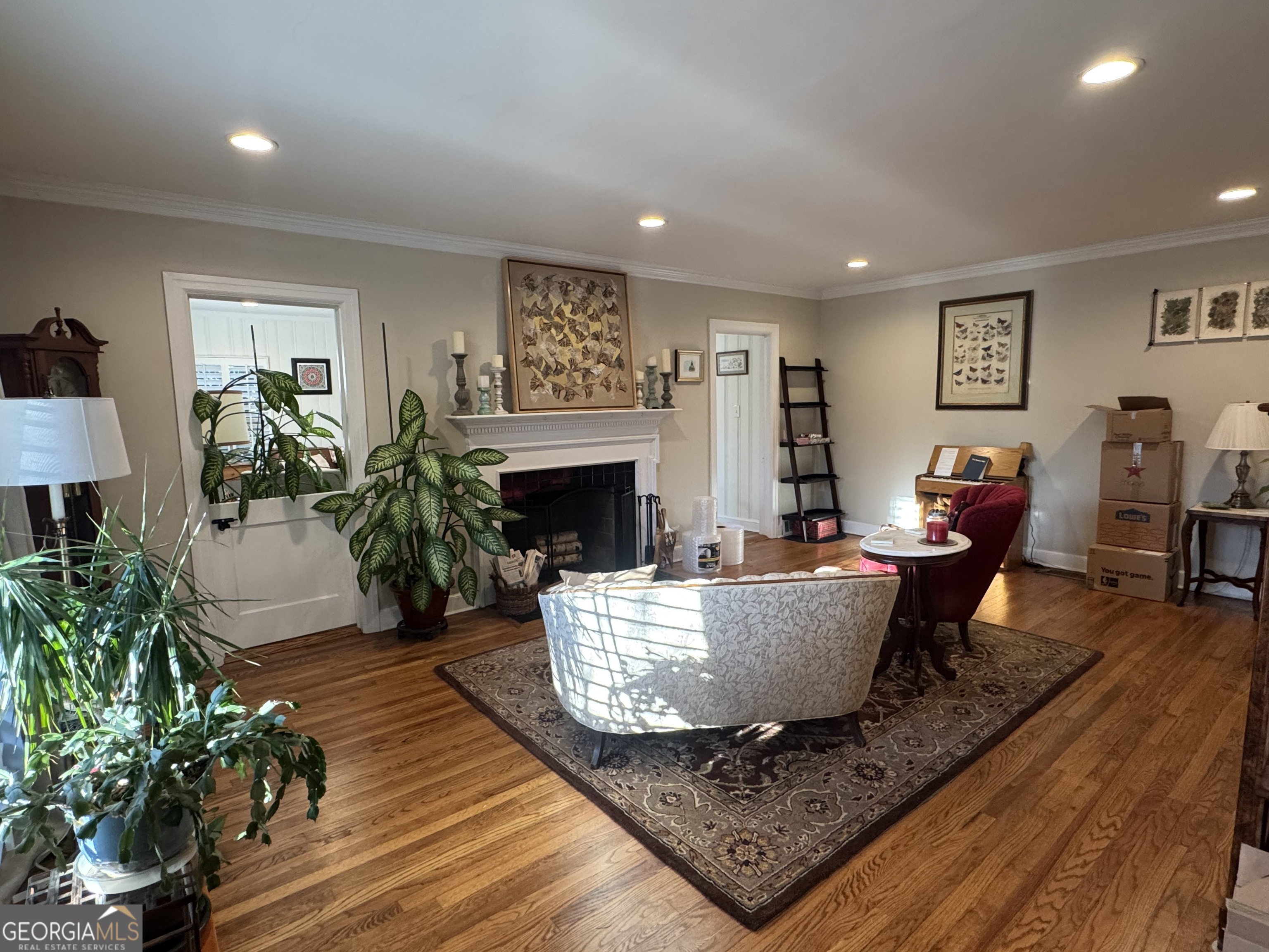 722 Maple Drive Griffin, GA 30224 - Photo 7 of 28 a living room with furniture and a fireplace