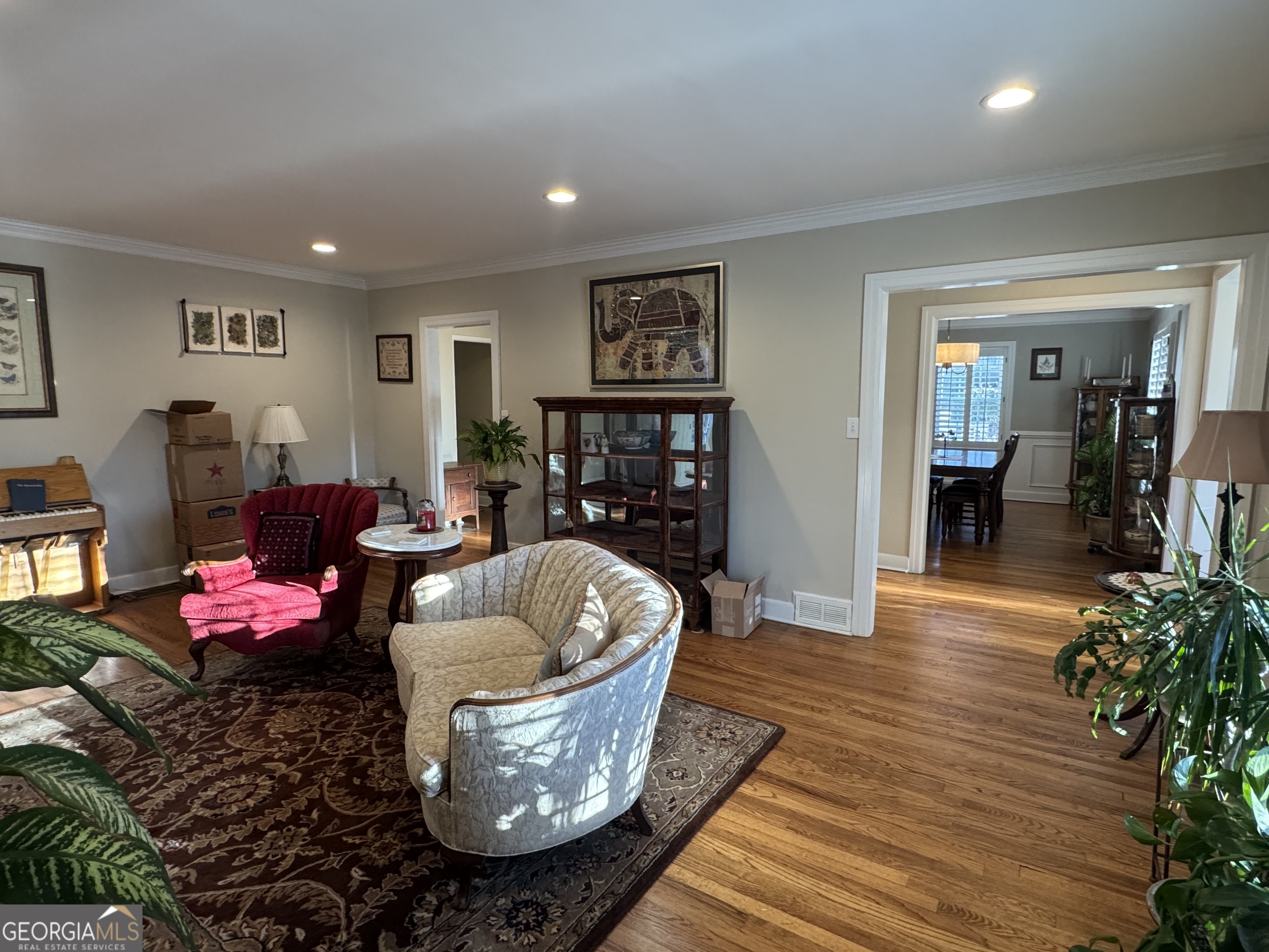 722 Maple Drive Griffin, GA 30224 - Photo 8 of 28 a living room with furniture and wooden floor