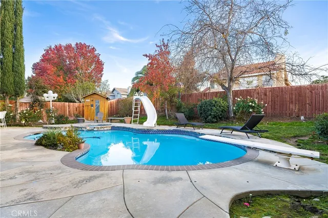 a front view of a house with swimming pool