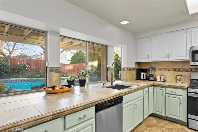 a living room with furniture fireplace and flat screen tv