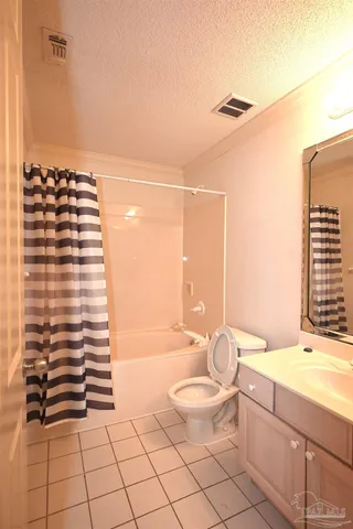 a bathroom with a bathtub and a sink