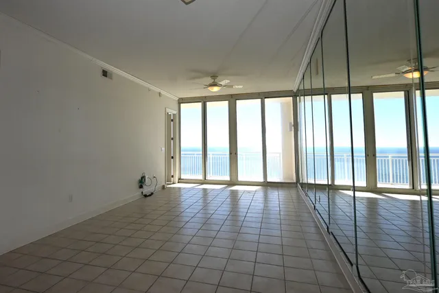 a view of an empty room with a window