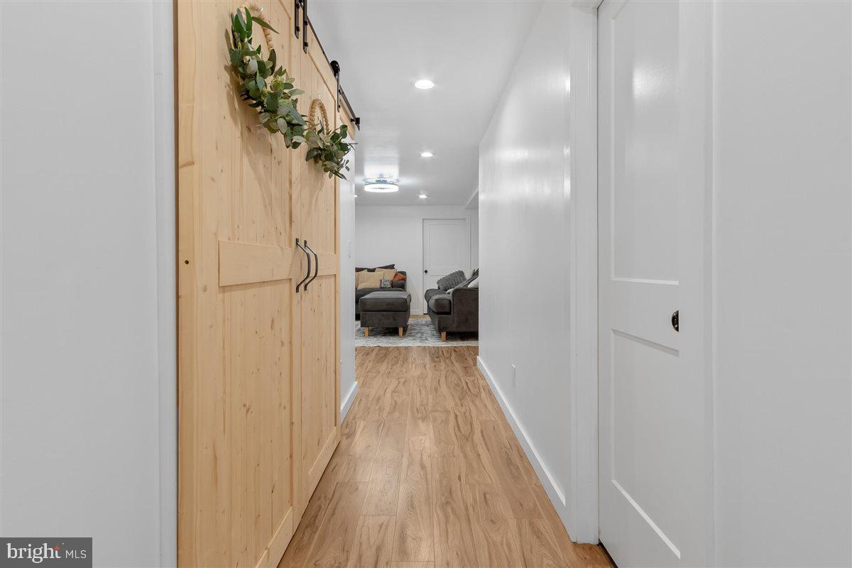 2390 Shirley Road Charles Town, WV 25414 - Photo 49 of 69 a view of hallway with wooden floor