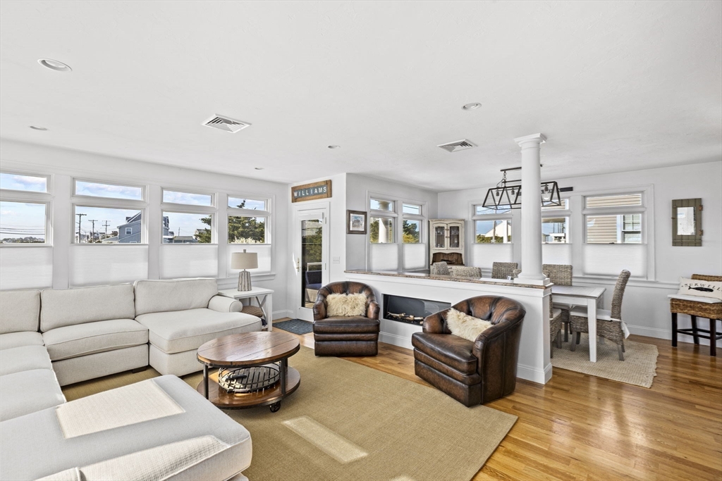 98 Central Avenue Scituate, MA 02066 - Photo 14 of 37 a living room with furniture and a large window