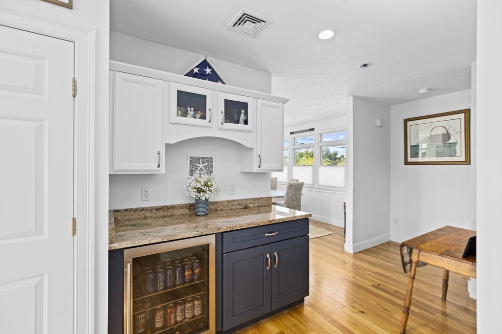 98 Central Avenue Scituate, MA 02066 - Photo 9 of 37 a kitchen with stainless steel appliances granite countertop a stove and a sink