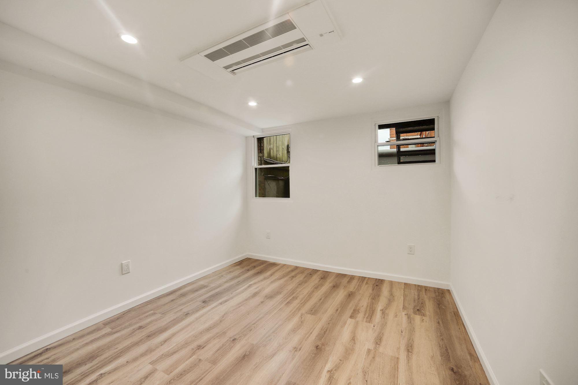 1215 S Street Northwest, Unit B Washington, DC 20009 - Photo 14 of 18 a view of empty room with wooden floor